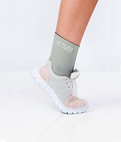 Helpingarthritis ankle support worn under socks and shoes